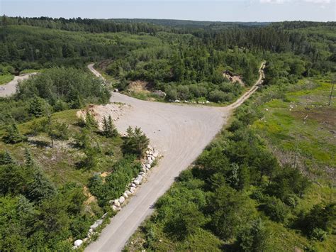 A magnifying glass. . Unorganized land for sale bancroft ontario
